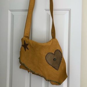 He’s MaHarry leather bag